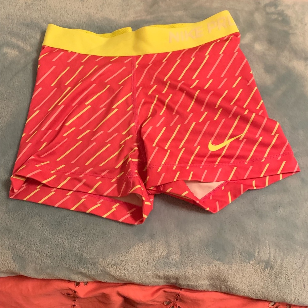 Yellow and Pink Nike spandex